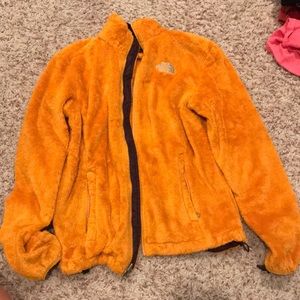 Orange north face jacket